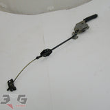 OEM factory emergency brake or parking brake lever with cable, as removed from an R34 chassis Nissan Skyline, years 1998 - 2002 with 3GSpares logo