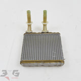 Nissan Skyline R34 heater core unit inside heater box behind dashboard part number 27140-15U00 with 3GSpares logo.
