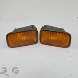 OEM factory front bumper turn signal or indicator lights, removed from an R34 chassis Nissan Skyline, years 1998 - 2002 with 3G Spares logo
