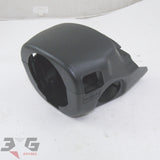 OEM factory upper and lower steering column surround set or covers, as removed from a R34 chassis Nissan Skyline, years 1998 - 2002 with 3GSpares logo. 