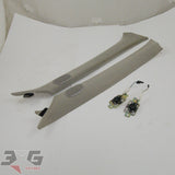 OEM factory optional left and right side tweeter A pillar trims with tweeters, as removed from an R34 chassis Nissan Skyline Sedan, years 1998 - 2002 with 3GSpares logo