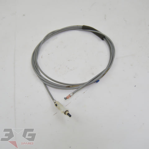 OEM Toyota JZX100 Chaser Mark II Cresta fuel lid lock control cable assembly, genuine part for GX100, JZX100, LX100 chassis 1996–2001.
