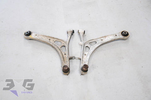 OEM Subaru Legacy BL5 Spec B front lower control arm pair – 20202‑AG102 (LH) and 20202‑AG151 (RH)