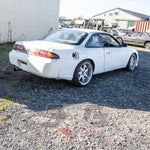 S14 Silvia rear-right view showing taillights, missing fuel cap and factory boot lid