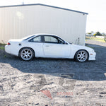 S14 Silvia right view showing taillights, missing fuel cap and factory boot lid