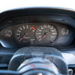 S14 Silvia OEM black face gauge cluster – showing 316,828 km with factory tachometer and speedometer

