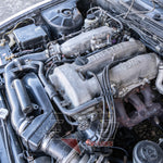 Nissan SR20DE engine – right-side view showing exhaust manifold and coil wiring harness