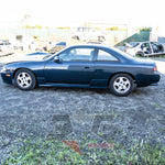 Nissan Silvia S14.5 side-on profile from the left, showing body lines and OEM wheels