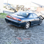 Nissan Silvia S14.5 rear-right angle showing quarter panel, factory antenna, and bumper