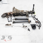 Nissan Silvia S14/S15 complete 5-speed manual conversion kit for SR20DE/SR20DET — includes gearbox, clutch pedal, slave cylinder, flywheel, driveshaft, and shifter.