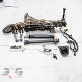 Nissan Silvia S14/S15 complete 5-speed manual conversion kit for SR20DE/SR20DET — includes gearbox, clutch pedal, slave cylinder, flywheel, driveshaft, and shifter.