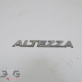 OEM factory rear trunk or boot badge, as removed from an SXE10 chassis Toyota Altezza, years 1998 - 2005 with 3GSpares logo. 