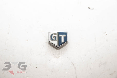 Nissan GT Fender Emblem Badge – 63896‑AA000 / 63896‑15U00 OEM Used Skyline
