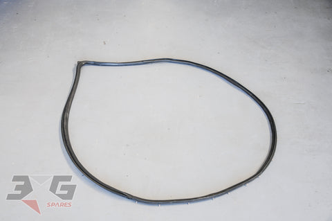 New OEM Nissan front right door weatherstrip 80830‑15U00 – authentic R33 Skyline sedan seal in good condition.