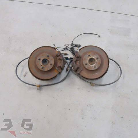 OEM Toyota AE111 rear disc brake and knuckle set with ABS and 4x100 hubs
