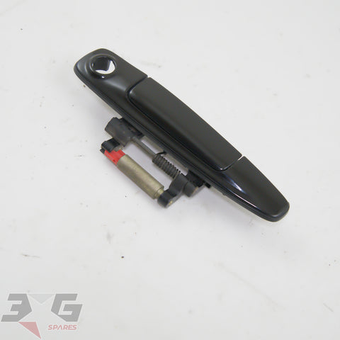 Nissan R34 Skyline left exterior door handle 80607-AA004 GV1 black OEM 1998-2002