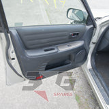 GXE10 Altezza passenger door card — dark trim panel and window controls