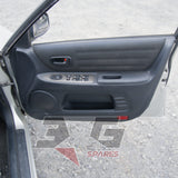 GXE10 Altezza driver door card — dark trim panel and window controls