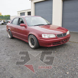 1997 Toyota AE111 Corolla GT front right exterior view in red, with 3GSpares logo