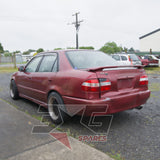 1997 Toyota AE111 Corolla GT rear left exterior view in red, with 3GSpares logo