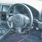 Subaru BP5 Legacy Spec B factory Momo steering wheel close-up — 6MT manual spec