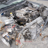 Nissan HR34 Skyline RB20DE Neo engine bay — top end detail