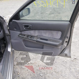 Nissan HR34 Skyline GT door trim panel — interior condition view