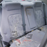 Nissan HR34 Skyline GT rear seat condition close-up — factory upholstery