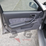 Nissan HR34 Skyline GT front door trim card — factory cloth insert and window controls