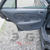Toyota AE111G Sprinter Carib BZT rear door trim card — factory cloth insert and handle