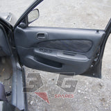 Toyota AE111G Sprinter Carib BZT driver door card — trim panel and window controls