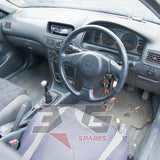 Toyota AE111G Sprinter Carib BZT dashboard and steering wheel — RHD interior overview