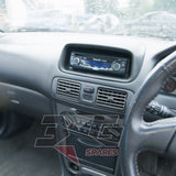 Toyota AE111G Sprinter Carib BZT head unit area — centre dash and climate controls