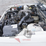 1997 Nissan Laurel HC34 Medalist RB20E engine bay overview — 3GSpares NZ