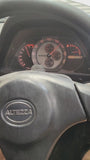 Close-up of Toyota GXE10 Altezza gauge cluster during a dyno gearbox test, showing precise shift points and RPM stability under load.